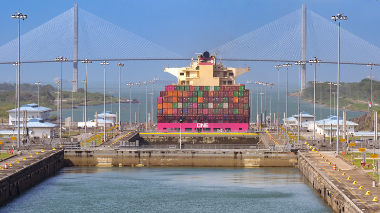 23 January 2024: Agua Clara locks on the Panama canal. In the background is a container ship and the Atlantic Bridge