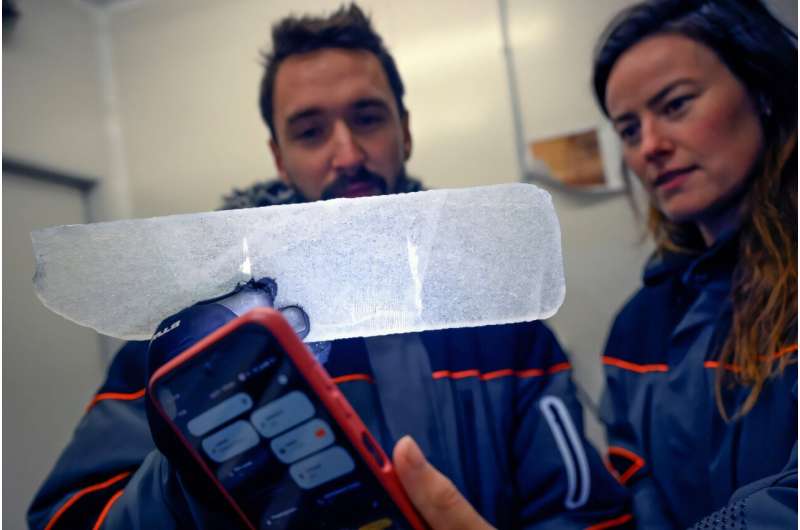 Belgian scientists study Antarctic ice cores. Belgian scientists study Antarctic ice cores
