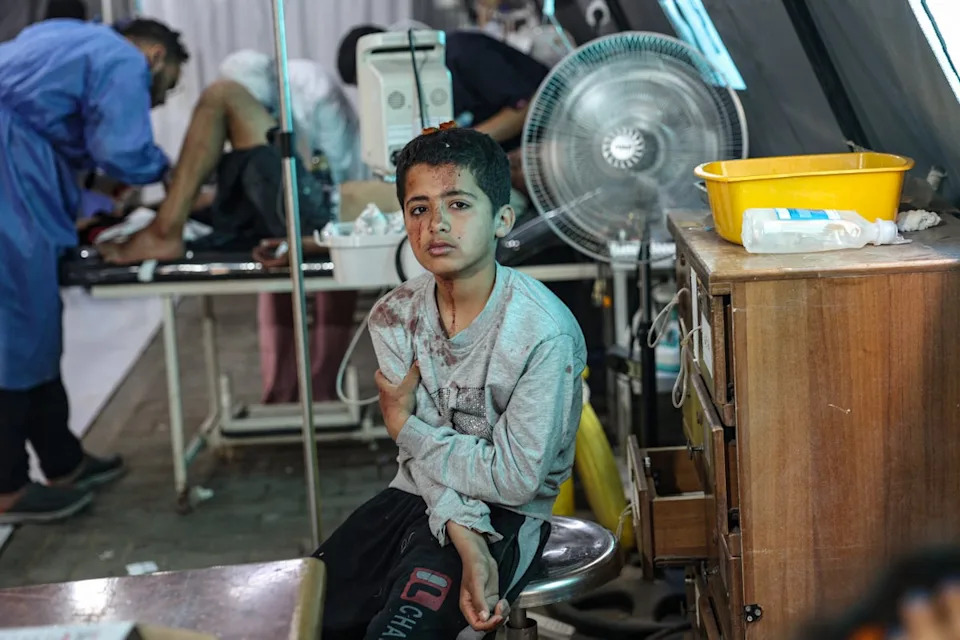 An injured Palestinian boy awaits treatment at the Kuwaiti hospital following Israeli strikes in Rafah in the southern Gaza Strip (AFP/Getty)