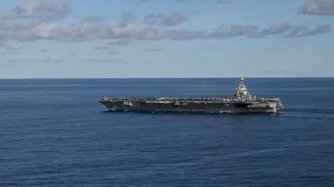 Getty Images The world's largest aircraft carrier USS Gerald R Ford sails in the North Sea during NATO Neptune Strike 2025 exercise on 24 September 2025