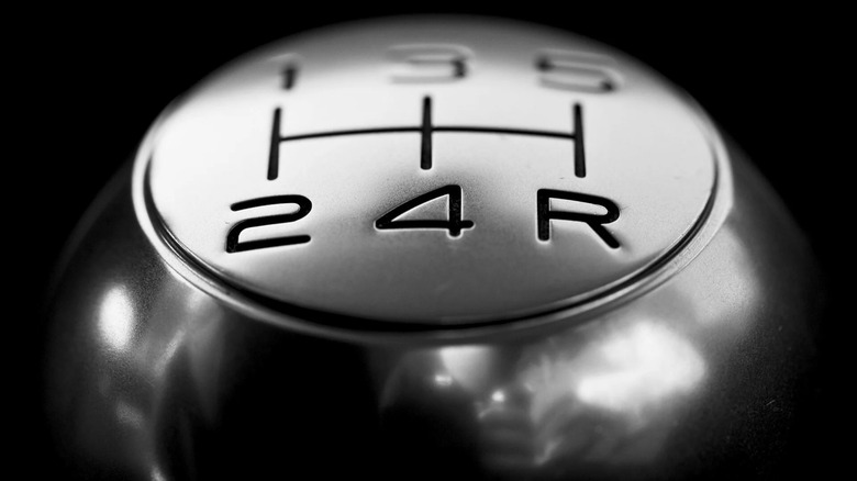 Close-up of a five-speed manual transmission shift knob