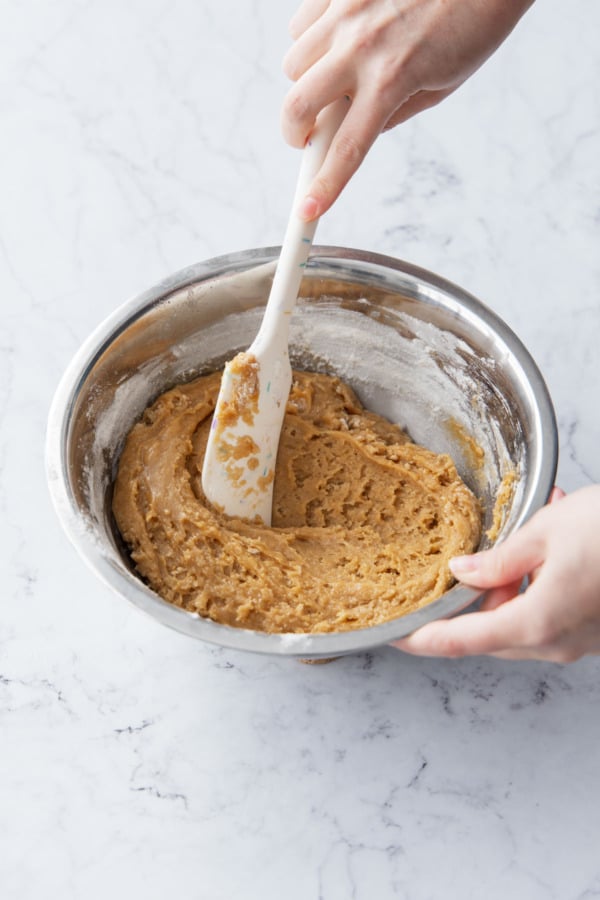 The final consistency of the dough will be soft and slightly oily, but will firm up as it sits at cool room temperature.