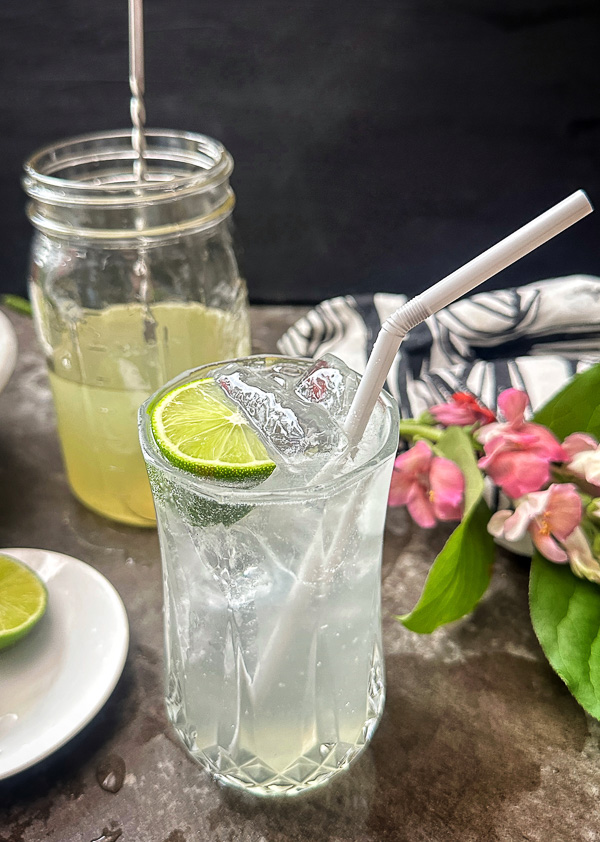 Homemade Sparkling Limeade with fresh lime juice and simple syrup. A bright, sweet-tart citrus drink and easy dupe for Sol Food sparkling limeade.