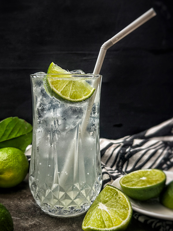 Homemade Sparkling Limeade with fresh lime juice and simple syrup. A bright, sweet-tart citrus drink and easy dupe for Sol Food sparkling limeade.