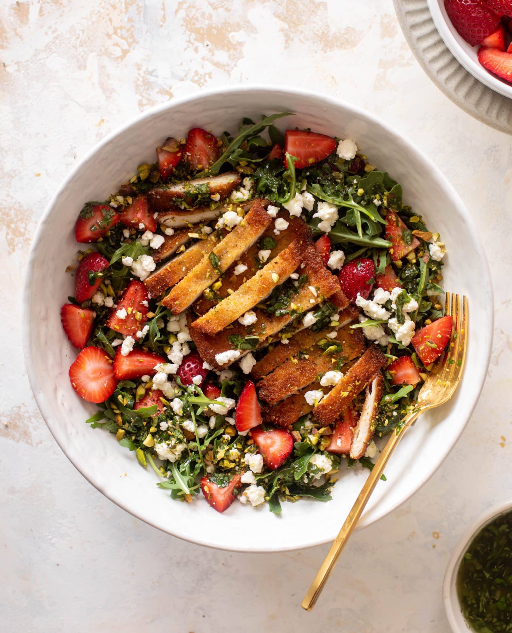 strawberry pistachio salad with crispy chicken