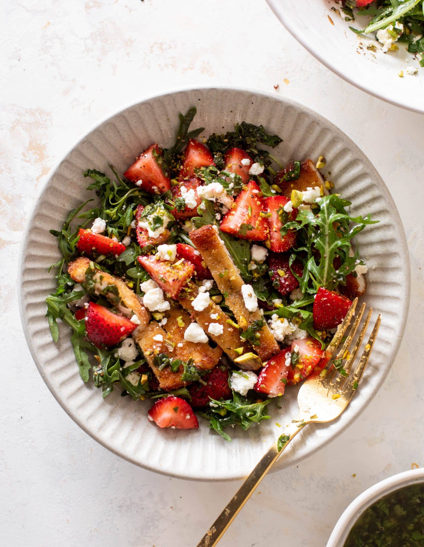strawberry pistachio salad with crispy chicken
