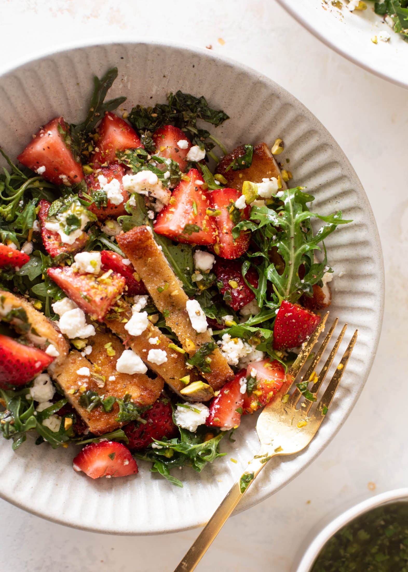strawberry pistachio salad with crispy chicken