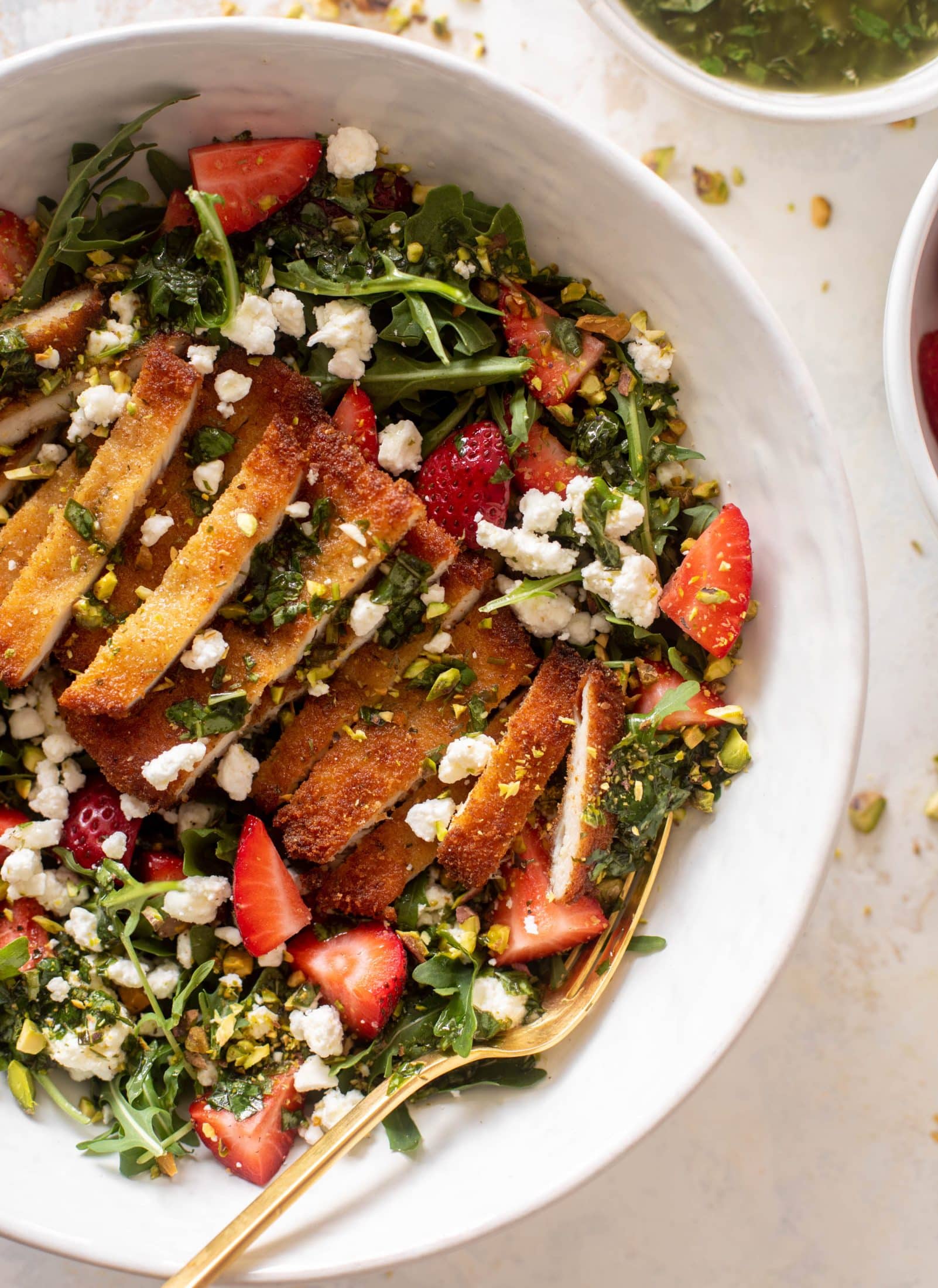 strawberry pistachio salad with crispy chicken