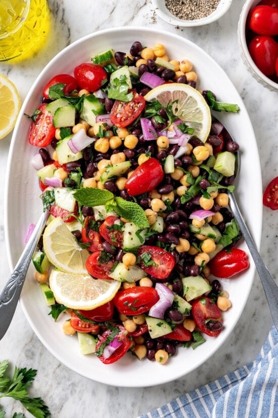 Garbanzo bean Mediterranean salad in serving bowl.