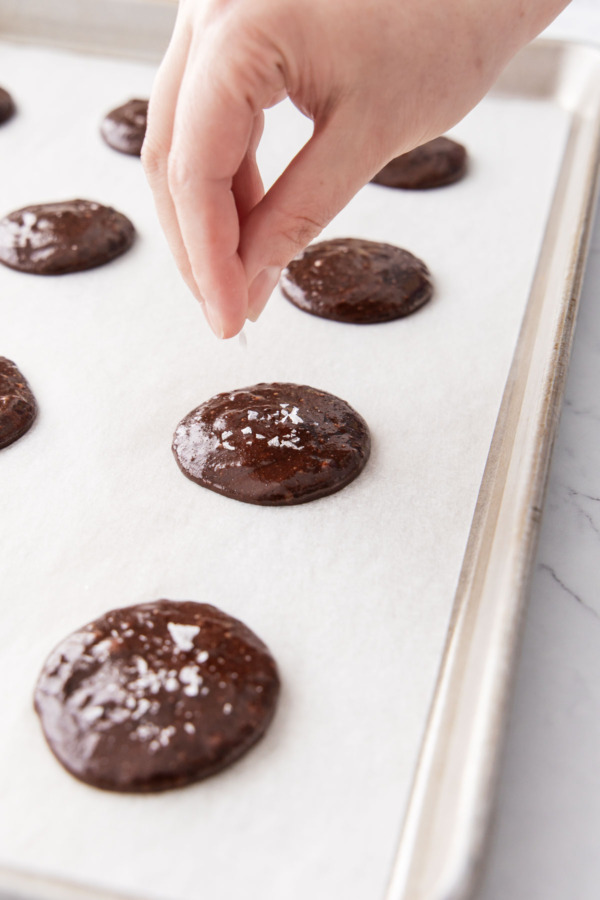 Before baking, sprinkle tops of cookies with flake sea salt if desired.