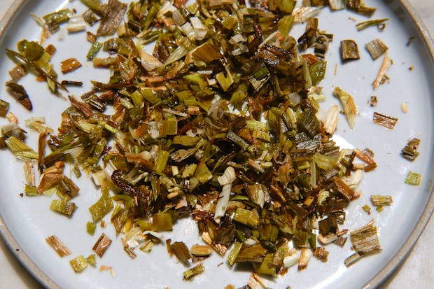 scallions cut into flecks for cherry tomato tart topping and filling