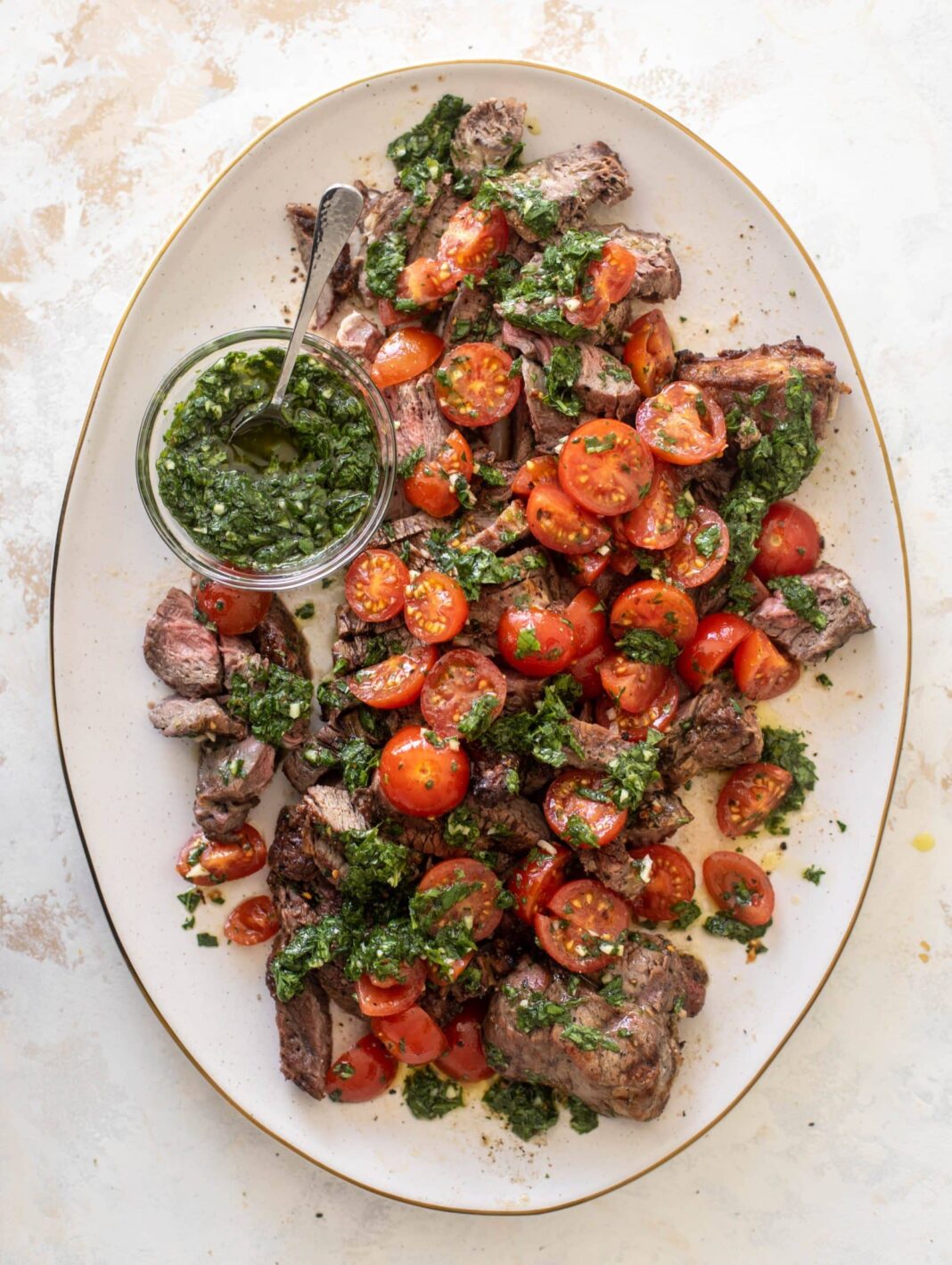 Grilled Steak with Marinated Tomatoes and Chimichurri